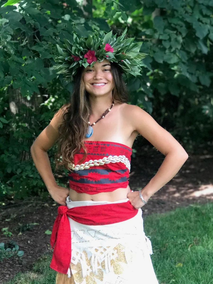Michigan Moana performer smiling in costume